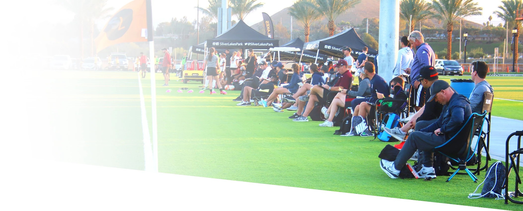 College coaches scouting from the sideline